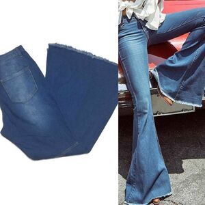 VINTAGE Bell Bottom High Rise Raw Cut Distressed Stretchy Mid Wash Jeans